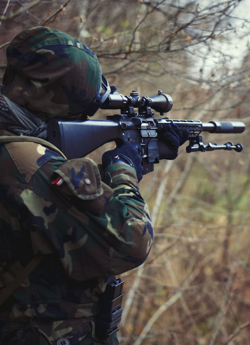 man-in-camouflage-army-uniform-holding-rifle-3706709